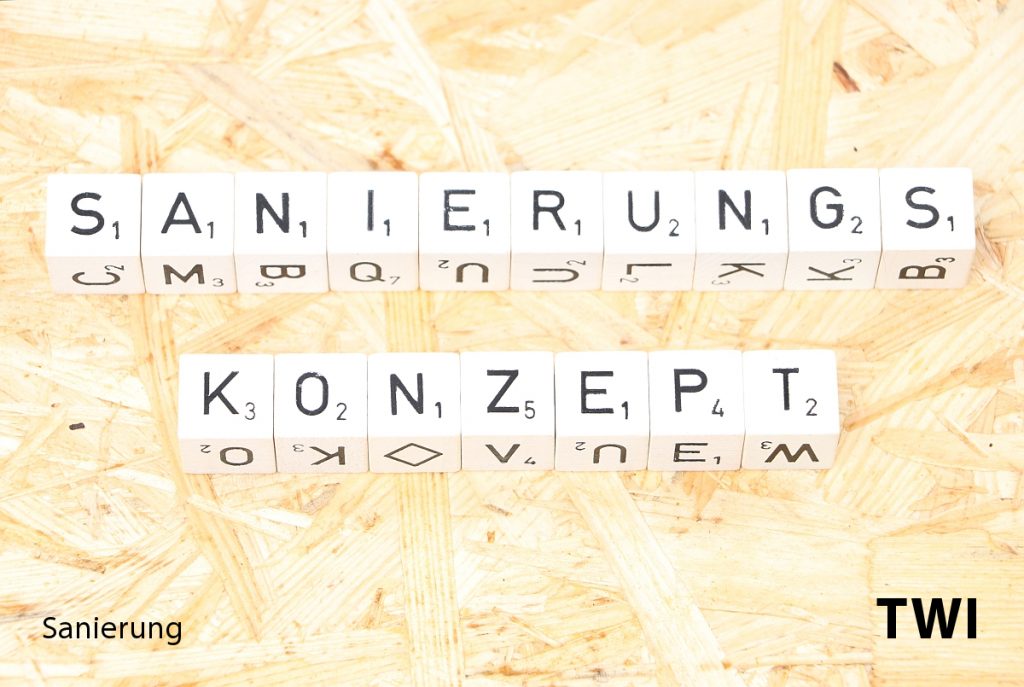 Das Wort "Sanierungskonzept" mit Buchstabenwürfel geschrieben.